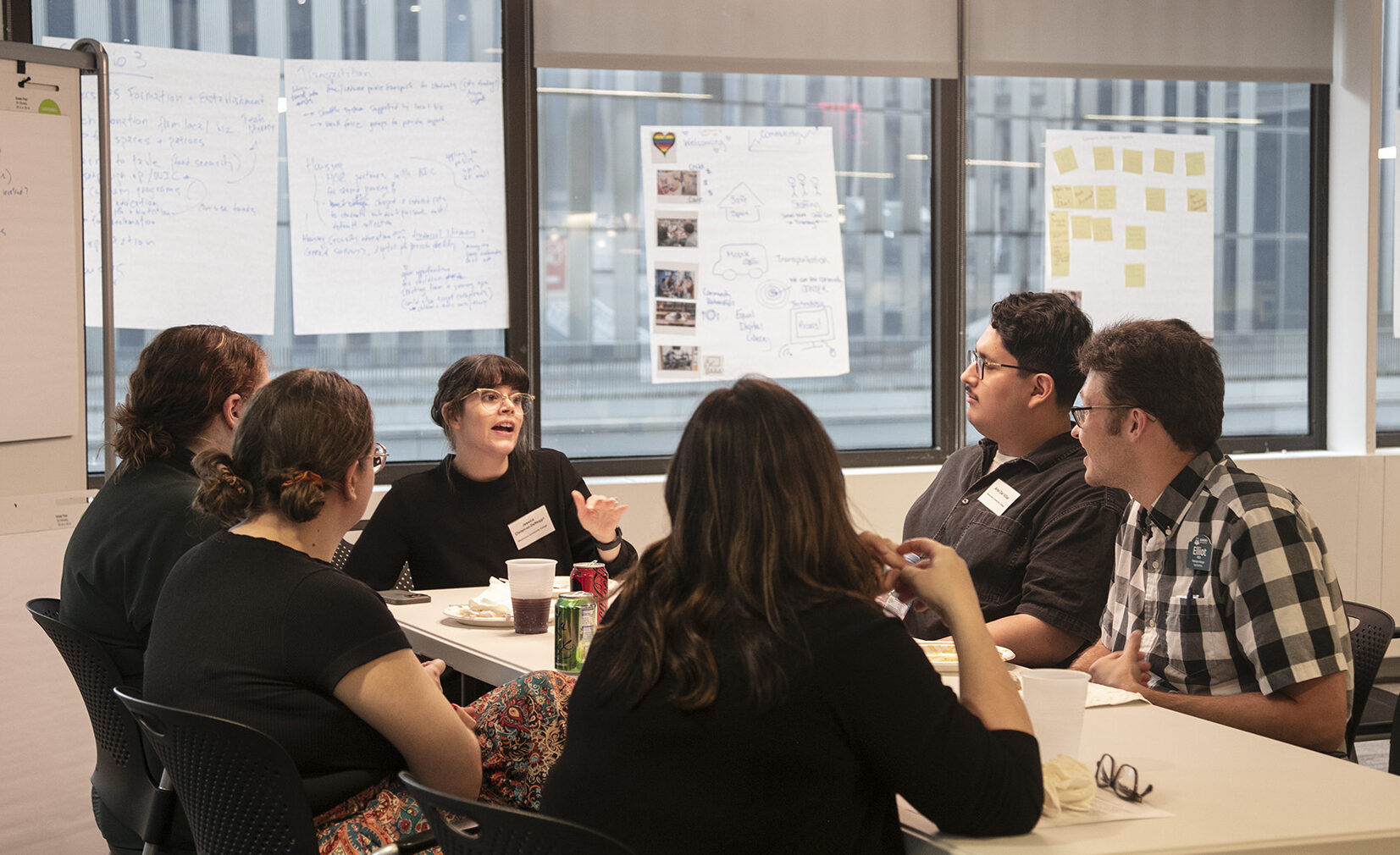 Group of people brainstorming in a breakout session.